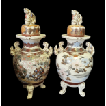 A PAIR OF EARLY 20TH CENTURY JAPANESE EXPORT WARE SATSUMA VASES Decorated with court scenes.