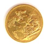 A VICTORIAN 22CT GOLD SOVEREIGN COIN, DATED 1875 With young Queen Victoria portrait and George and