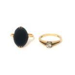 A VINTAGE 9CT GOLD AND DIAMOND SOLITAIRE RING The single round cut diamond on a pierced shank,