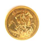 AN EARLY 20TH CENTURY 22CT GOLD FULL SOVEREIGN COIN, DATED 1931 With a King George V portrait and