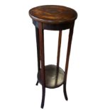 AN EDWARDIAN MAHOGANY TWO TIER JARDINIÈRE PLANT STAND Raised on four splayed legs. (h 100cm)