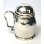 A SMALL 18TH CENTURY WHITE METAL BALUSTER BEER MUG AND COVER The domed cover having a concave