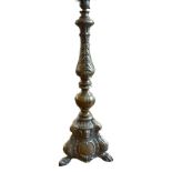 A LATE 19TH CENTURY ROCOCO MANNER BRASSCHURCH ALTAR CANDELABRUM The base embossed with Ruben's