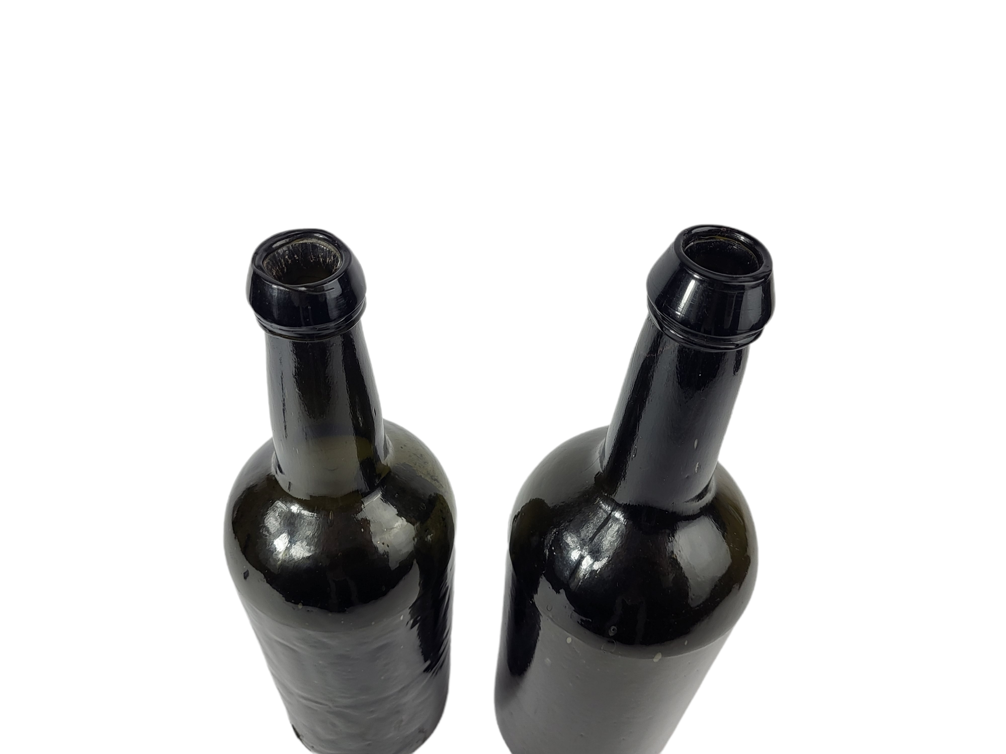 TWO MID 18TH CENTURY DARK GLASS CYLINDER WINE BOTTLES Moulded with circular medallion depicting a - Image 4 of 10