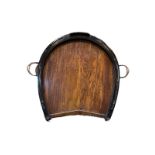 AN EARLY 20TH CENTURY OAK AND MAHOGANY TWIN COPPER HANDLED HORSESHOE FORM BUTLER'S HUNTING TRAY. (