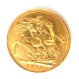 AN EARLY 20TH CENTURY 22CT GOLD FULL SOVEREIGN COIN, DATED 1921 With George and Dragon design to