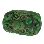 A LARGE CHINESE CARVED AND PIERCED JADE PENDANT Decorated with fauna and flora. (length 10cm)