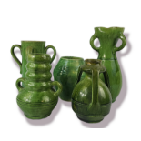 ARTS & CRAFTS, A CONTINENTAL GREEN GLAZED FOUR LOOP HANDLED VASE Provincial type, three handled