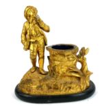 A 19TH CENTURY CONTINENTAL GILT BRONZE FIGURAL SPILL VASE A solitary figure in 18th Century