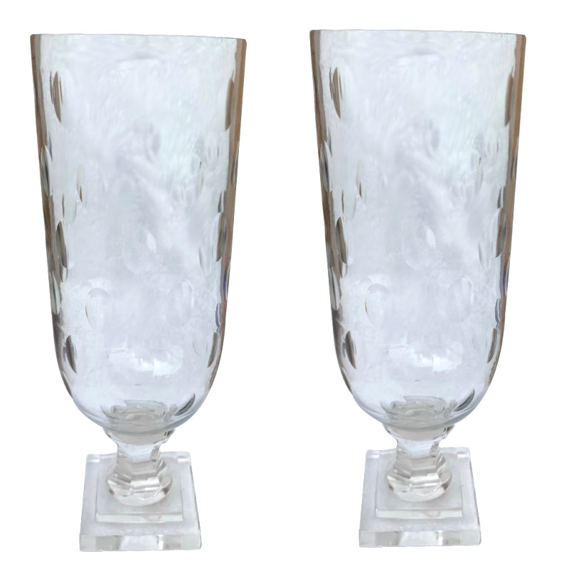 A PAIR OF CUT GLASS STORM LAMPS With engraved oval decoration. (h 34cm) Condition: good