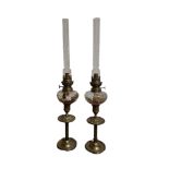 A PAIR OF 19TH CENTURY FRENCH BRASS AND GLASS OIL LAMPS Marked 'Paris'