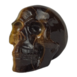 A TIGERSEYE SKULL CARVING. (length 8cm) Condition: good