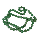 A STRING OF GREEN ROUND JADE BEADS. (length 46cm) Condition: good