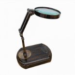 WATTS & SONS LTD, A LIBRARY MAGNIFYING GLASS ON ADJUSTABLE STAND. (h 30cm) Condition: good