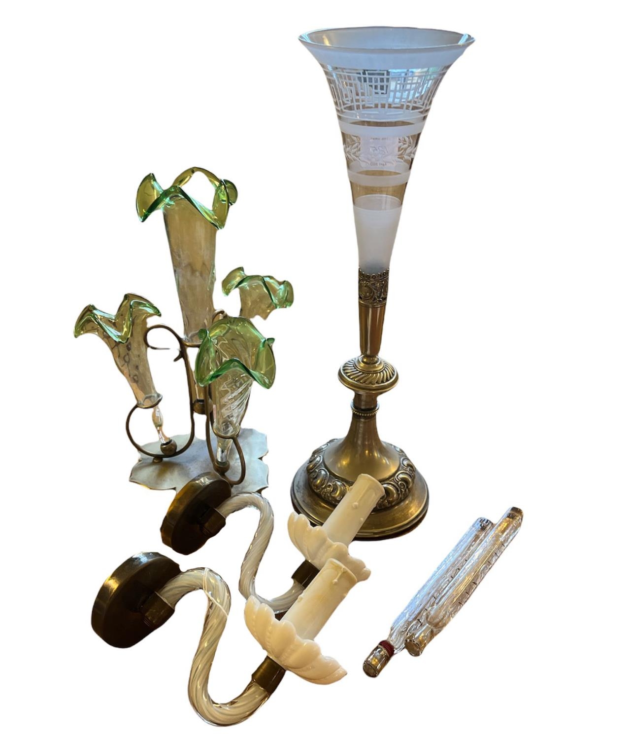 AN EDWARDIAN THREE TRUMPET GLASS VASE EPERGNE Each green glazed vase with frill fluted rim, raised