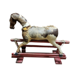 A 19TH CENTURY WOODEN ROCKING HORSE Straw filled body with leather. (h 91cm x length 107cm x w 36cm)