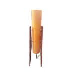 A VINTAGE FLOORSTANDING ROCKET LAMP With orange shade and three teak legs. (90cm) Condition: good