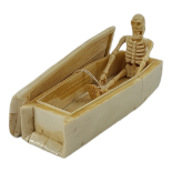 A POLISHED BONE COFFIN AND SKELETON Momento inscription to base. (length 12cm) Condition: good