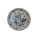 A VERY LARGE CERAMIC CHINESE BLUE AND WHITE DECORATED CHARGER PLATE Depicting a dragon and