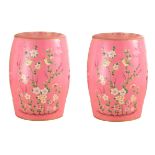 A PAIR OF CHINESE CERAMIC PINK BARREL GARDEN SEATS Decorated with birds and flowers. (h 46cm x