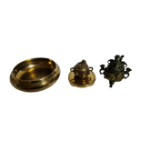 TWO CHINESE BRONZE KOROS Along with a polished bronze Chinese censor. (censor diameter 20cm)