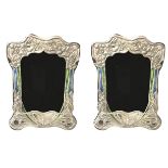 A PAIR OF STERLING SILVER AND ENAMEL ART NOUVEAU STYLE PHOTOGRAPH FRAMES With butterfly