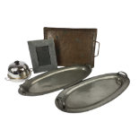 W & CO., A PAIR OF 20TH CENTURY PEWTER OVAL HAND BEATEN TWIN HANDLED TRAYS Stamped 'Homeland