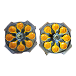 A PAIR STUDIO CERAMIC WALL LIGHTS In burnt orange and brown glazes. (diameter 28cm) Condition: