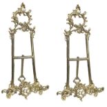 A PAIR OF LARGE ORNATE GILT BRASS EASELS. (h 43cm) Condition: good