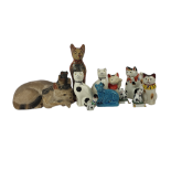 A DECORATIVE MIXED COLLECTION OF CATS To include a pair of Arthur Wood porcelain cats in 19th