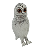 A SILVER PLATED BRASS OWL SUGAR SIFTER With amber glass eyes. (h 15.5cm) Condition: good