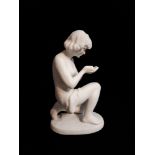 A PARIAN SEMICLAD KNEELING FIGURE. (h 24cm) Condition: good