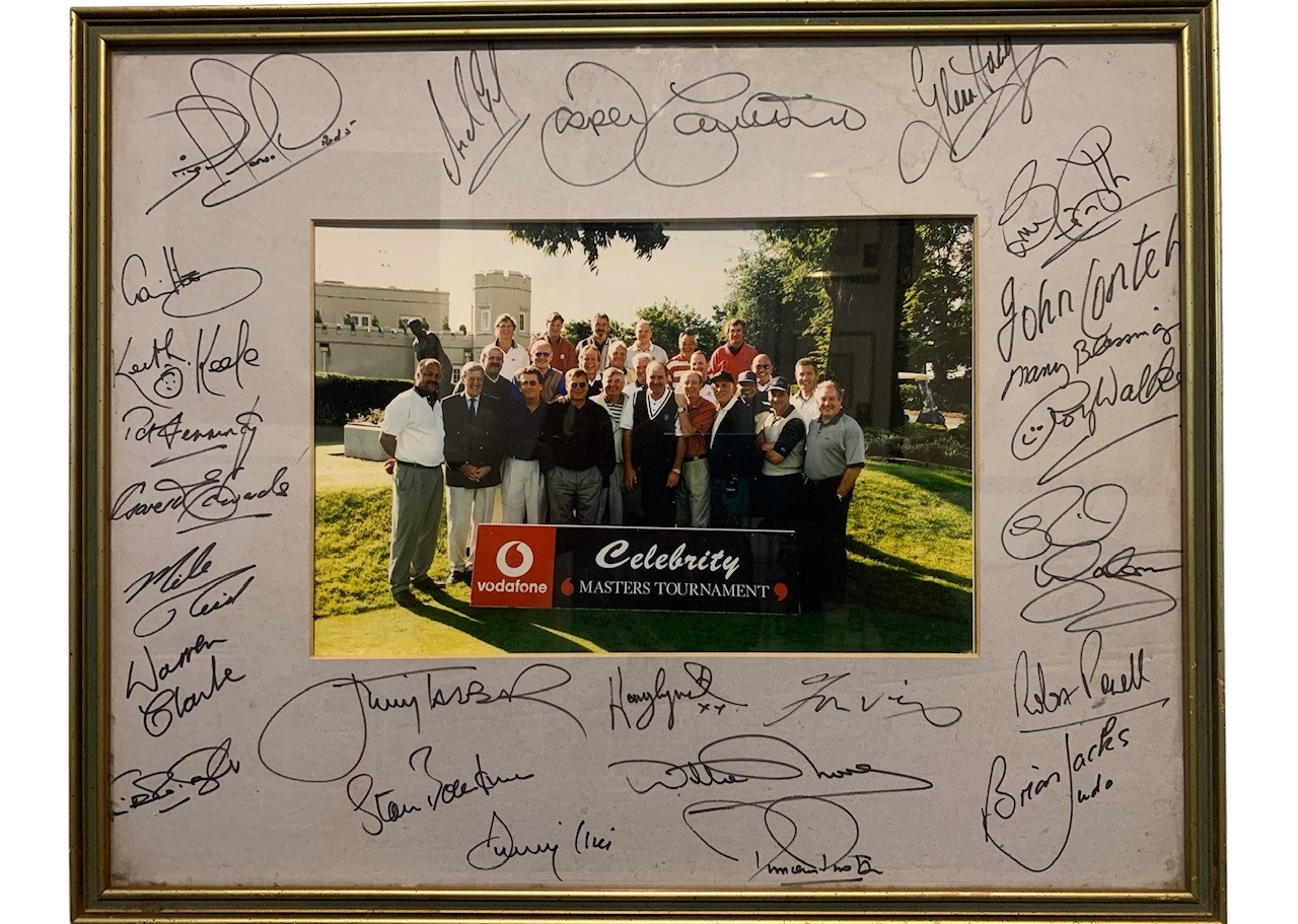 AN INTERESTING SIGNED PHOTOGRAPH OF THE CELEBRITY MASTERS VODAFONE TOURNAMENT, 1999 Signed on