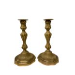 A PAIR OF 19TH CENTURY OF LOUIS XV STYLE GILT ORMOLU BALUSTER CANDLESTICKS Having detachable nozzles