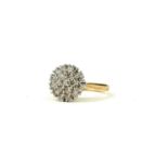 A 9CT GOLD, ROUND BRILLIANT CUT DIAMOND CLUSTER RING. (Diamonds 1.03ct)