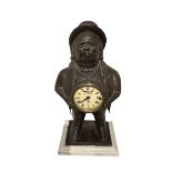 A 19TH CENTURY CAST IRON JOHN BULL BLINKING EYE NOVELTY CLOCK Enamel dial marked 'Jerome & Co.,