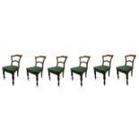 A GOOD SET OF SIX VICTORIAN SOLID ROSEWOOD SADDLE BACK DINING CHAIRS With overstuffed seats,