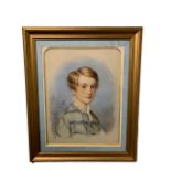 AN EARLY 19TH CENTURY BRITISH SCHOOL WATERCOLOUR With traces of pencil portrait of a young boy,
