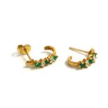 A PAIR OF 18CT GOLD EMERALD AND DIAMOND EARRINGS Each having two pairs of round cut diamonds