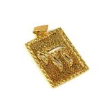 A CONTINENTAL YELLOW METAL RECTANGULAR PENDANT With Hebrew inscription on textured ground. (approx