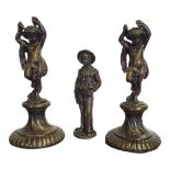 A PAIR OF 19TH CENTURY SMALL PATINATED BRONZE BACCHANALIAN CHERUBS Both in standing position, raised