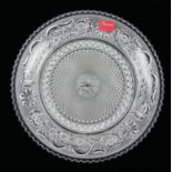 BACCARAT, A FRENCH CUT LEAD CRYSTAL CIRCULAR PLATE With embossed scrolls and cut spiral design to