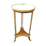 A REGENCY STYLE WALNUT AND GILT BRONZE SIDE TABLE The circular white marble top raised on six faux