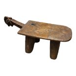 AFRICAN TRIBAL ART INTEREST, A LATE 19TH CENTURY MODERN CEREMONIAL STOOL Top carved with symmetrical