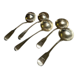 A COLLECTION OF FIVE GEORGIAN SILVER LADLES Fiddle pattern, with engraved family crest, to include a