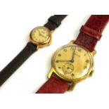 VERTEX, A VINTAGE 9CT LADIES' WRISTWATCH The circular cream dial with Arabic number markings, on a