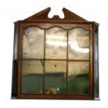 A 19TH CENTURY MAHOGANY WALL HANGING GLAZED DISPLAY CABINET With an architectural pediment above a