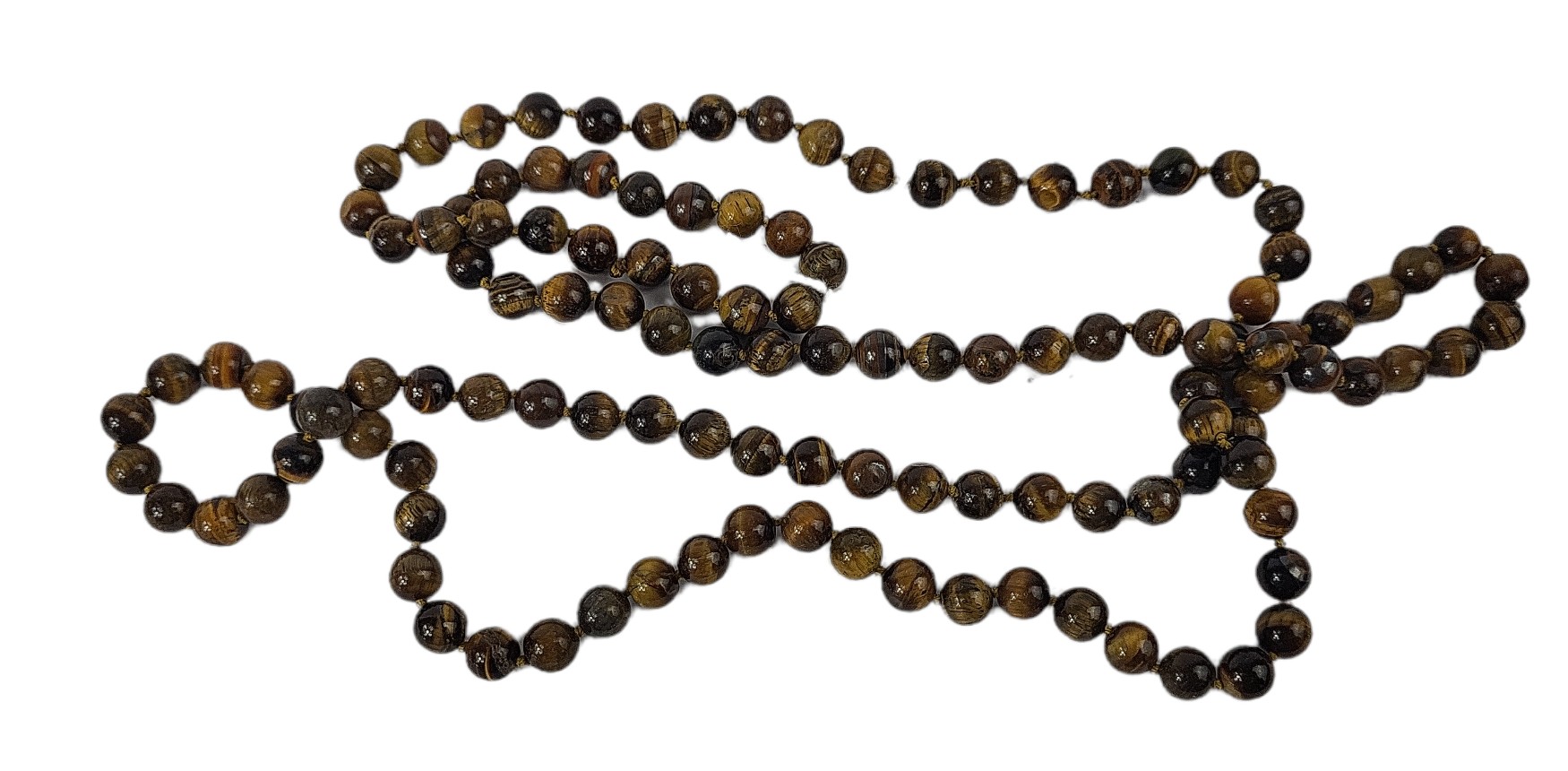 A STRING OF TIGERS-EYE ROUND BEADS. (length 56cm) Condition: good