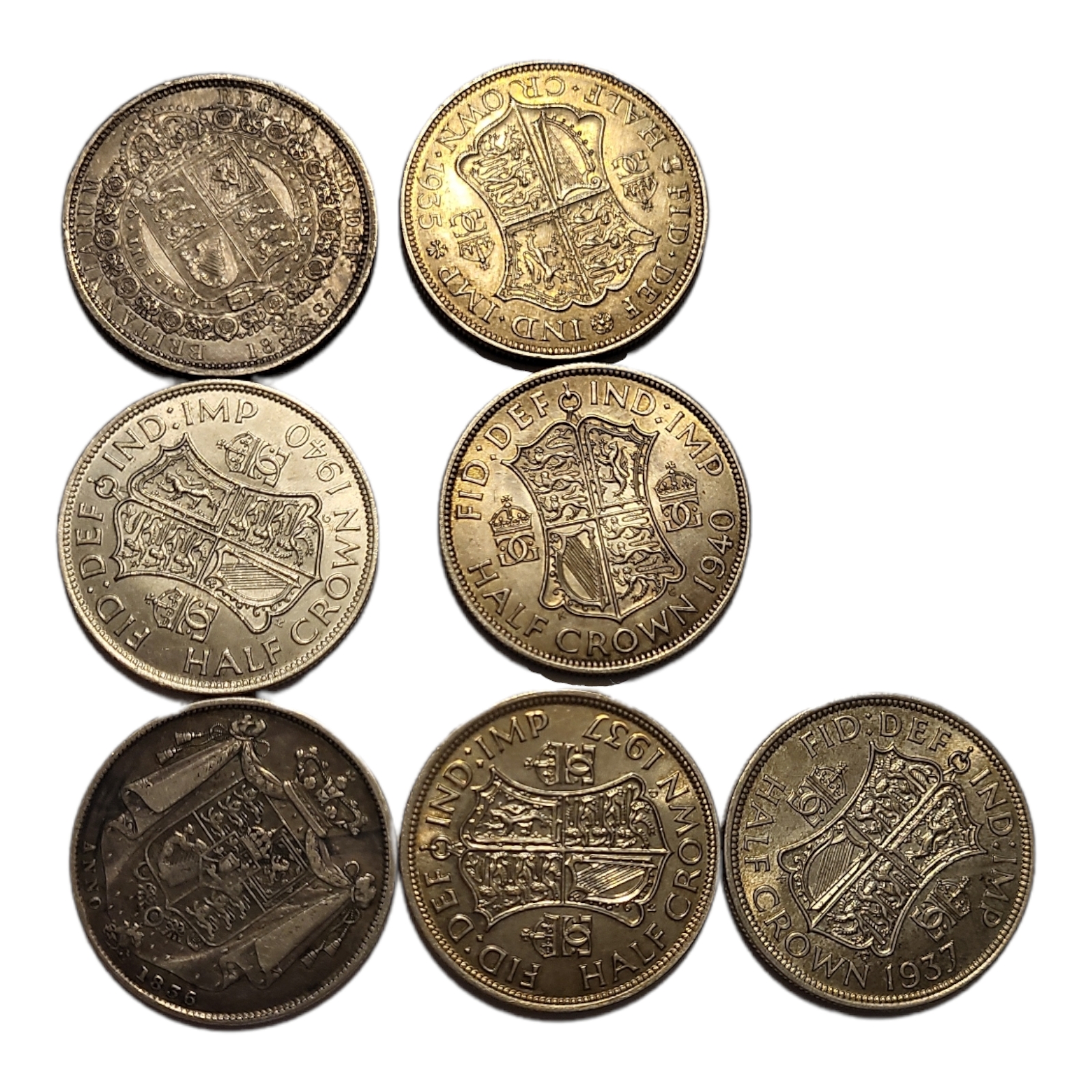 A COLLECTION OF SEVEN 19TH CENTURY AND LATER HALF CROWN COINS To include King William IV coin, dated