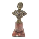 A 19TH CENTURY FRENCH PATINATED BRONZE BUST, PARISIAN LADY IN ELABORATE DRESS TOP Raised on brown